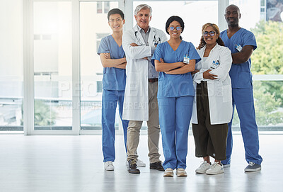 Buy stock photo Portrait, doctors and team of nurses with arms crossed standing together in hospital. Face, confident and medical professionals, surgeons or group with healthcare collaboration, teamwork and happy.