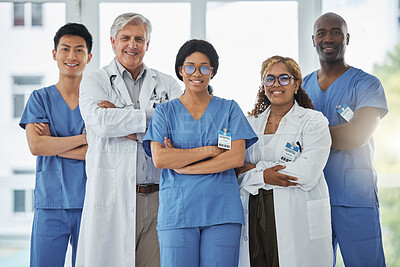 Buy stock photo Nurses, portrait and team of doctors with arms crossed standing together in hospital. Face, confident and medical professionals, surgeons or group with healthcare collaboration, teamwork and happy.