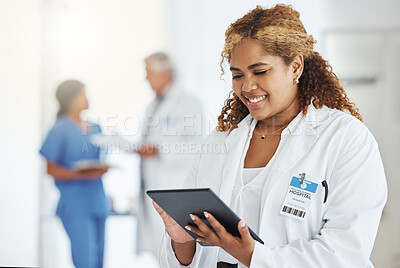 Buy stock photo Smile, woman and doctor with tablet for research, telehealth or healthcare in hospital. Technology, medical professional and African female surgeon with email, wellness app and online consultation.