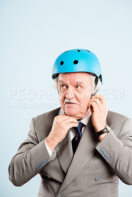 Buy stock photo Studio, man and thinking with bicycle helmet for protection, safety or reduce risk of head injury. Senior person, thoughts or ideas with gear by white background for business owner, travel or commute