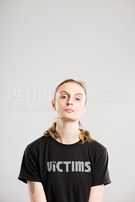 Buy stock photo Portrait, woman and fashion as confident in streetwear or printed tshirt as human rights activist. Female person, edgy and trendy in studio background for casual, clothes or wardrobe with pride in UK