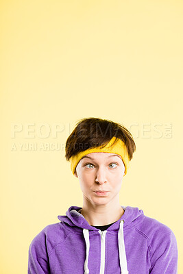 Buy stock photo Happy, goofy and face of woman in studio with funny, comic or crazy facial expression. Playful, comedy and portrait of young female model with silly personality isolated on yellow background