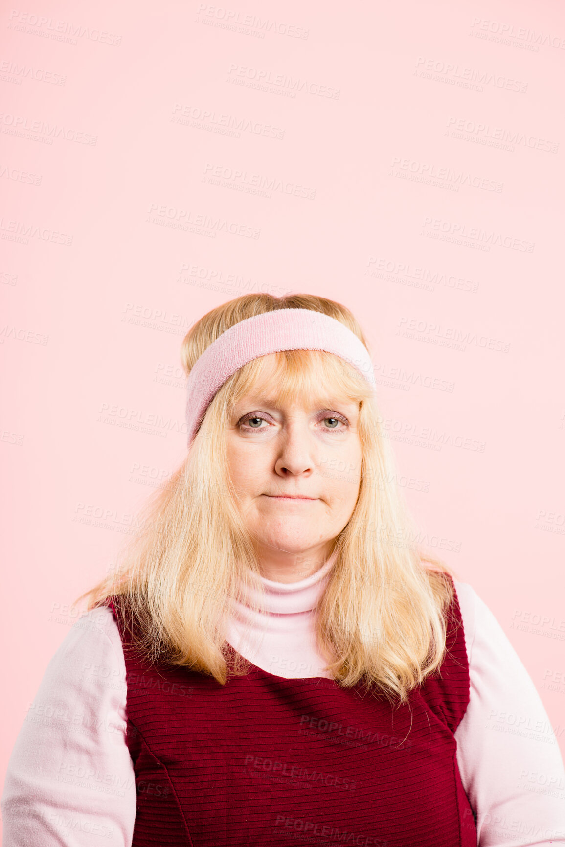 Buy stock photo Retro, exercise and portrait of woman with headband, serious and gym workout in studio mockup. Pride, face and mature person with vintage style, fitness fashion or confidence on pink background space