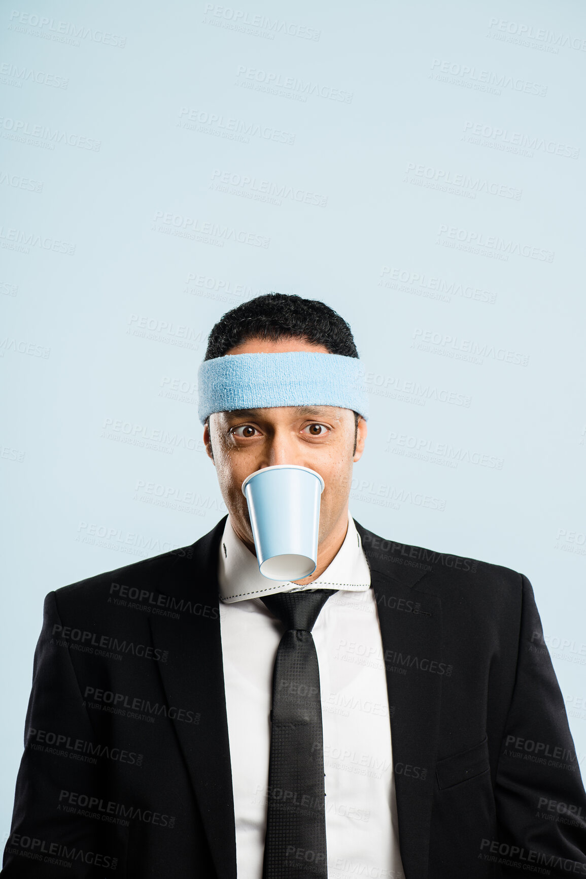 Buy stock photo Funny, mockup and man with coffee cup in studio for fitness with retro headband for workout. Caffeine addict, goofy and male athlete drink takeaway cappuccino or latte with vintage exercise fashion.