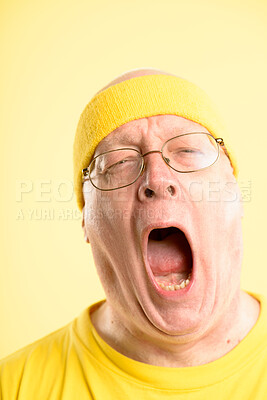 Buy stock photo Studio, portrait and man with yawning for fitness, exercise workout and exhausted by yellow background. Isolated, mature person and tired with low energy for cardio, sleepy and vintage headband