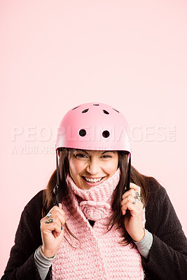 Buy stock photo Shot of a mature woman standing alone in the studio and wearing a helmet