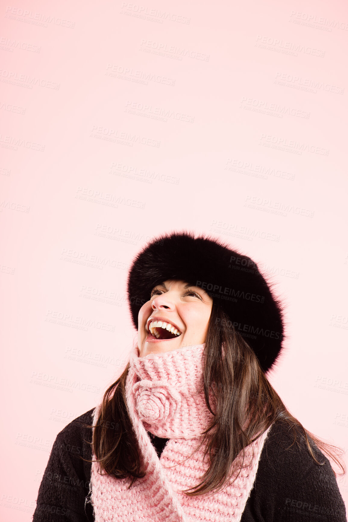 Buy stock photo Woman, laughing and winter fashion in studio, warm clothes and comfy style on pink background. Female person, confident and casual scarf for aesthetic, cold weather and trendy beanie for happiness