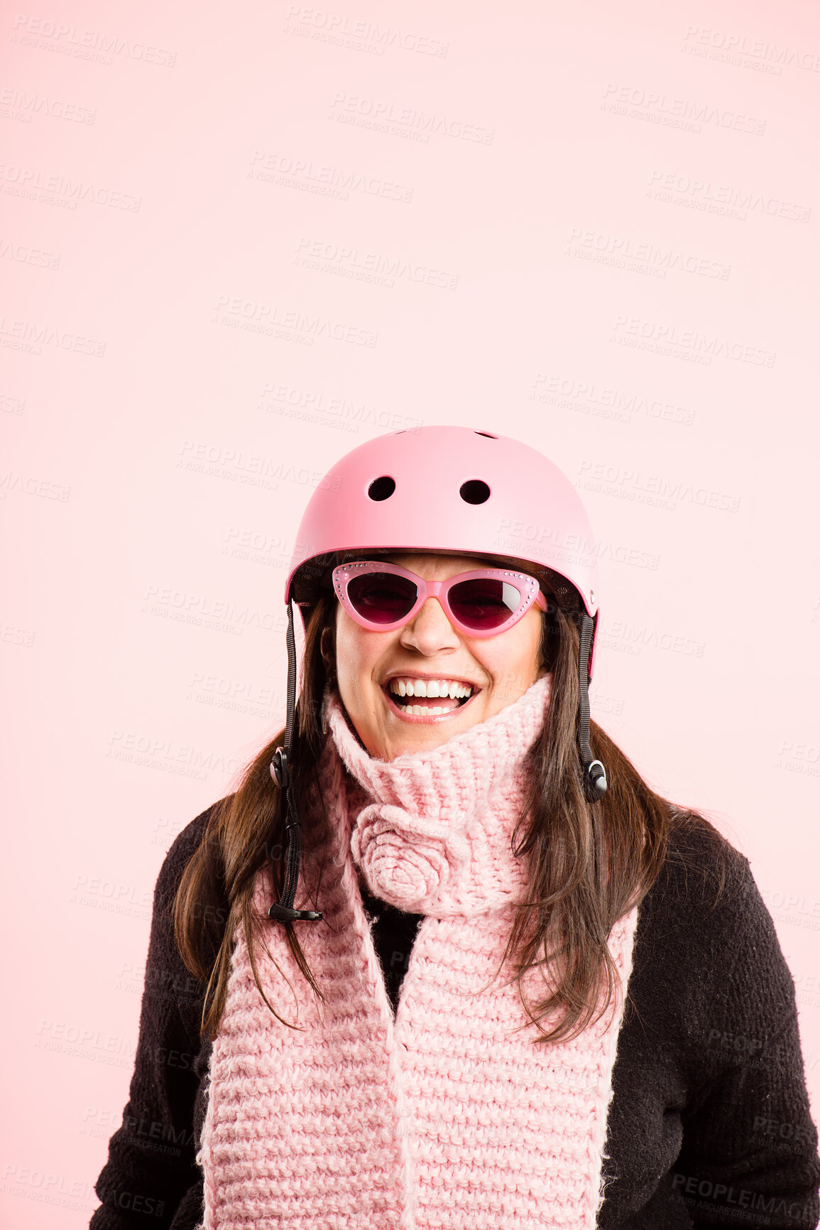 Buy stock photo Woman, studio and happy with sunglasses on helmet for transportation and riding bicycle on pink background. Laughing, fashion and smile or satisfied with safety gear for bike or cycling in style