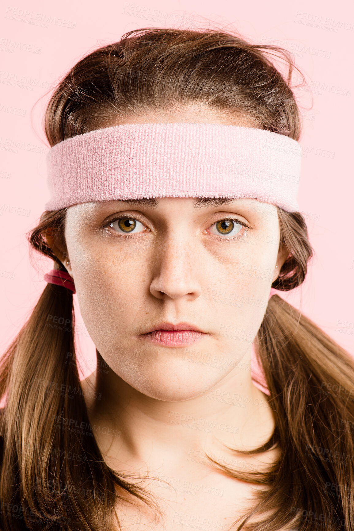 Buy stock photo Bored, fitness and portrait of woman with headband, retro fashion and workout coach for gym in studio. Athlete, face and girl with vintage style, exercise or serious on pink background in Australia