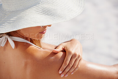 Buy stock photo Sunscreen, shoulder and a woman on the beach in summer for travel, vacation or holiday on the coast. Wellness, skincare and protection with a female tourist outdoor to apply lotion to her soft skin