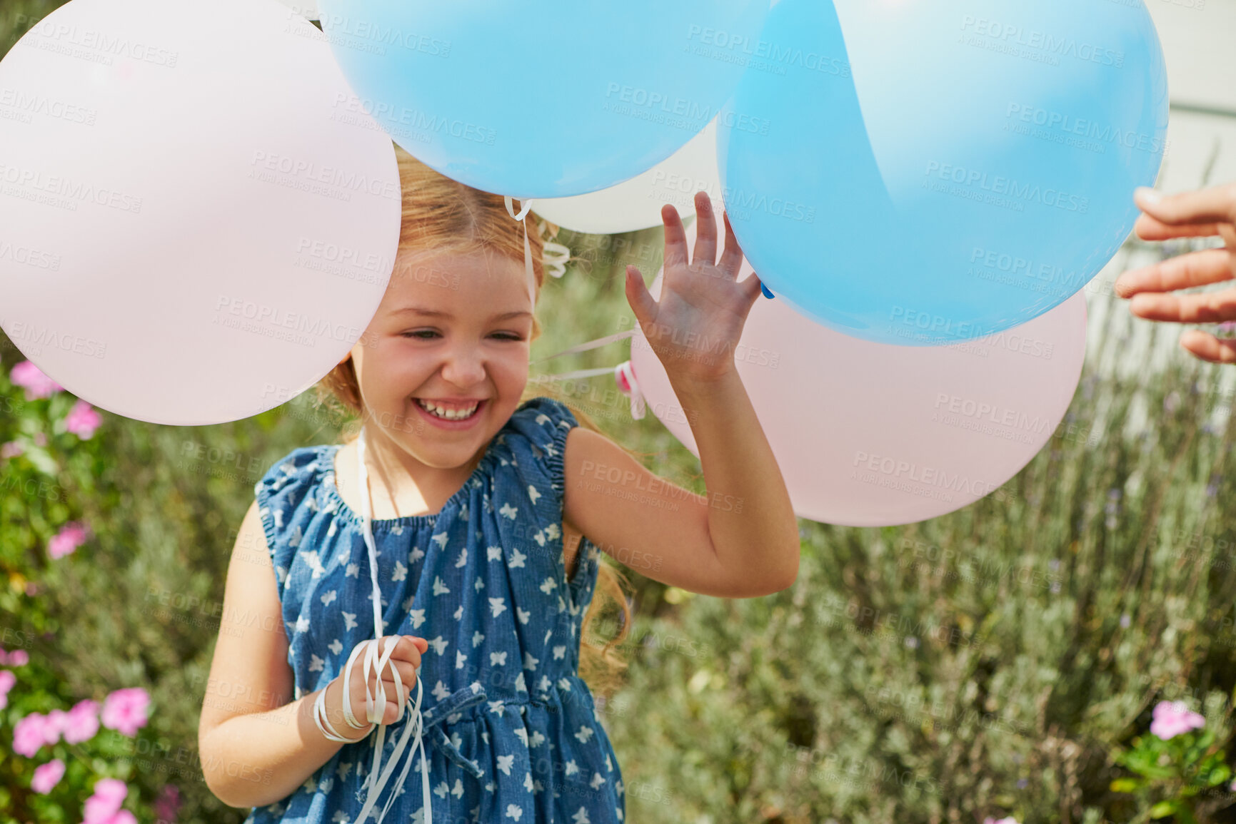 Buy stock photo Girl, child and happy with balloons in backyard for party, celebration and memory in summer sunshine. Kid, excited and smile in home garden for birthday with cheers, achievement and play in Germany