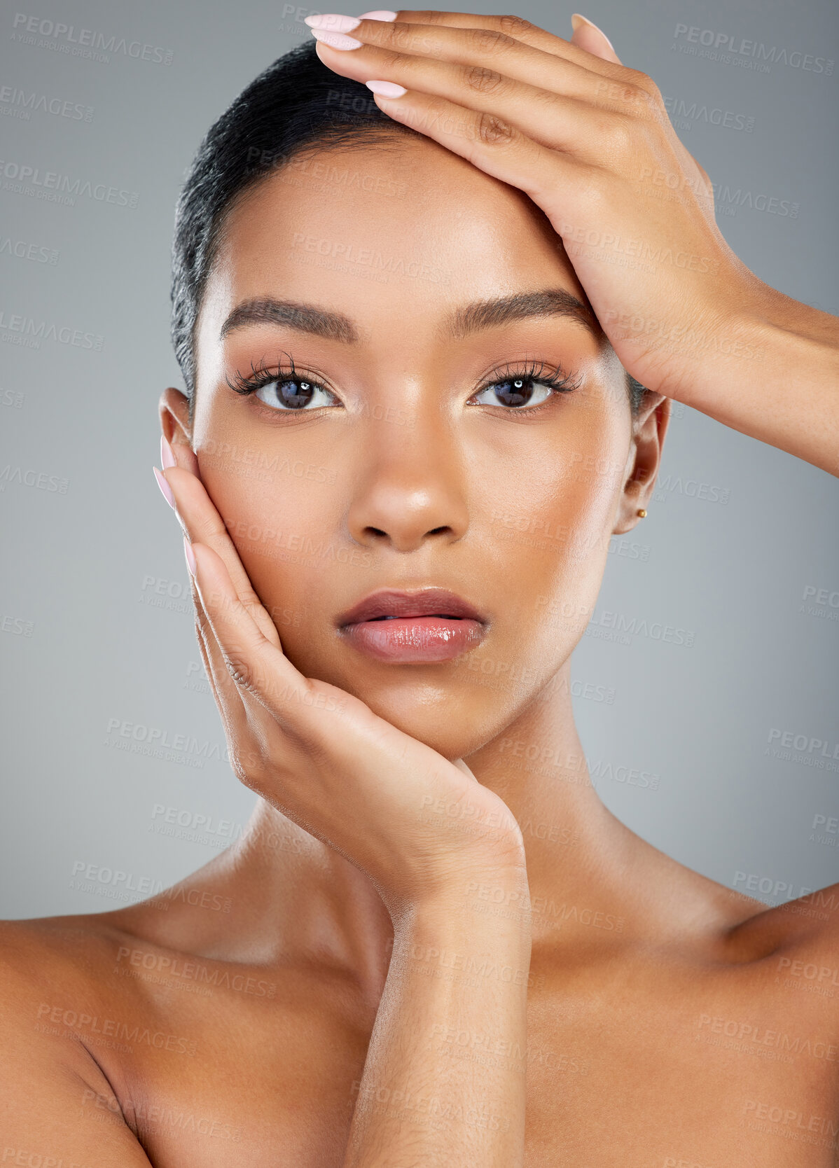 Buy stock photo Hands, makeup or portrait of model with skincare in studio on grey background fo facial glow. Dermatology treatment, woman or face of confident girl with cosmetics, beauty and transformation results