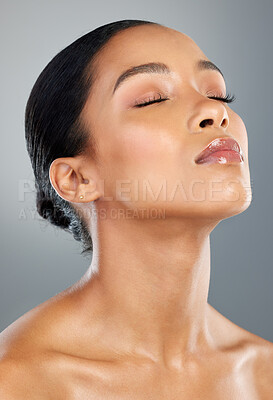 Buy stock photo Relax, makeup or calm woman with skincare or facial glow in studio on grey background. Dermatology treatment, elegant girl or face of confident model with cosmetics, beauty and transformation results