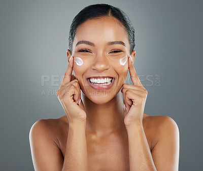 Buy stock photo Woman, portrait and happy with creme in studio for collagen treatment, skin hydration and beauty. Mockup, skincare and cosmetics product with hyaluronic acid, retinol and wellness on gray background