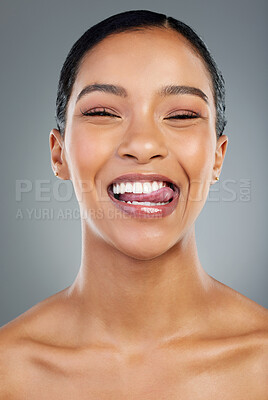 Buy stock photo Woman, tongue out and studio for oral health, smile and teeth whitening results on gray background. Female person, cosmetics and braces or veneers transformation, treatment and dental confidence