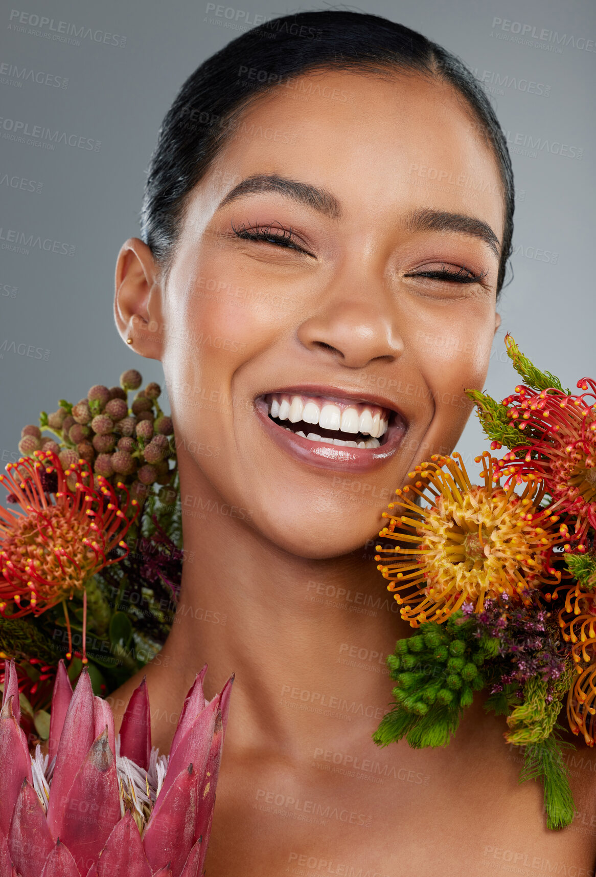 Buy stock photo Woman portrait, flowers and skincare in studio, cosmetics and organic treatment on gray background. Female person, vegan facial and confident for natural dermatology, fynbos and sustainable beauty