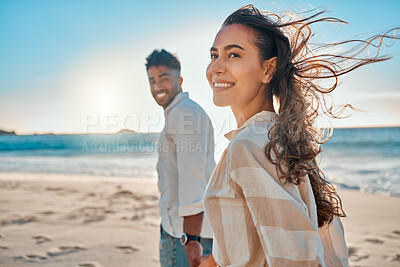Buy stock photo Love, happy and holding hands with couple on beach for honeymoon, relax and travel vacation. Summer, happiness and smile with man and woman walking on date for romance, care and support together