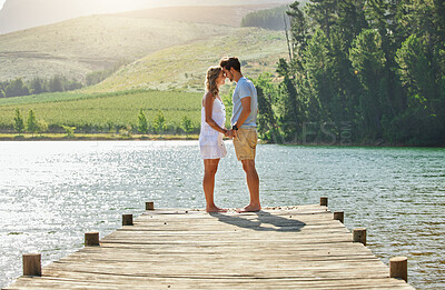 Buy stock photo Couple holding hands on jetty, relax by lake and summer, travel and adventure, love and care outdoor. People in relationship, trust and bonding on vacation, man and woman  are content with freedom