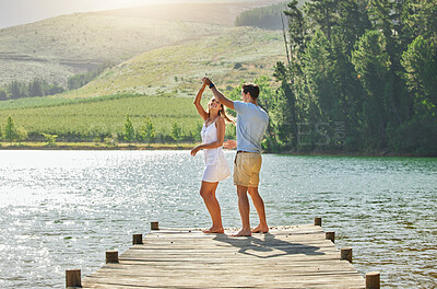 Buy stock photo Lake, dancing and happy nature couple on outdoor quality time together, fun countryside adventure or bonding getaway. Freedom peace, water and playful woman, man or romantic people dance on love date