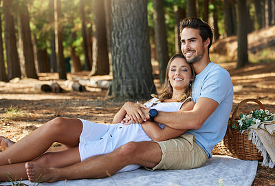 Buy stock photo Couple in nature park, cuddle and happy relationship with love and trust, travel and adventure outdoor. Young people hug in forest, outside and happiness together with smile, commitment and care 