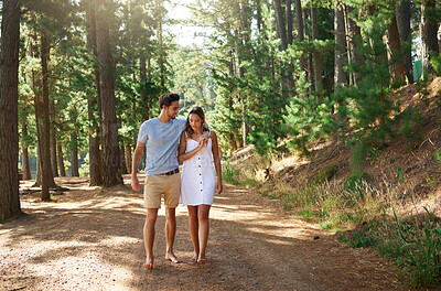 Buy stock photo Couple take a walk in forest, nature and travel, relax together with hug outdoor, love with care and bonding. Summer, holiday with man and woman strolling in countryside with relationship and trust