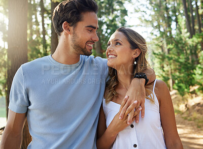 Buy stock photo Couple in nature, holding hands and happy relationship with love and trust, travel and adventure in park. Young people hug in forest, outdoor and happiness together with smile, commitment and care 
