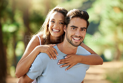 Buy stock photo Couple in nature, piggy back in portrait and happy relationship, love and trust with travel and adventure outside People in forest, outdoor and happiness together with smile, commitment and hug 