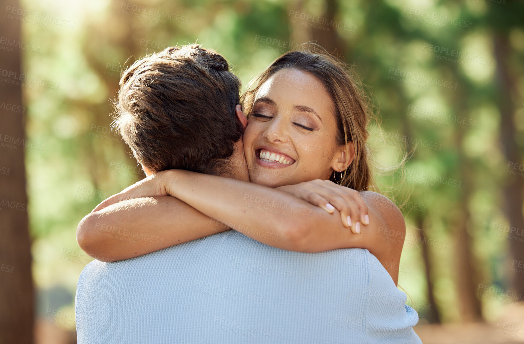 Buy stock photo Love, happy and forest couple hug on outdoor quality time together, hiking adventure or woods bonding journey. Peace, freedom and wilderness woman, man or romantic people embrace on nature date