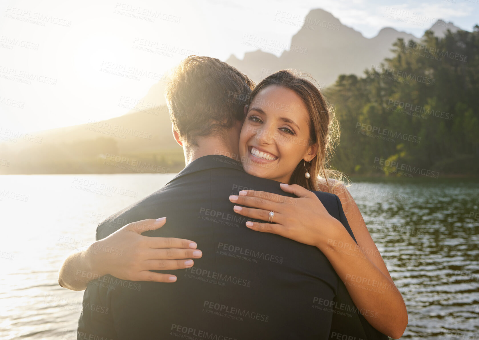 Buy stock photo Wedding, lake and portrait of happy couple hugging in nature and water with passion, smile and romance. Marriage, bride and groom hug to celebrate romantic relationship, loving man and woman together