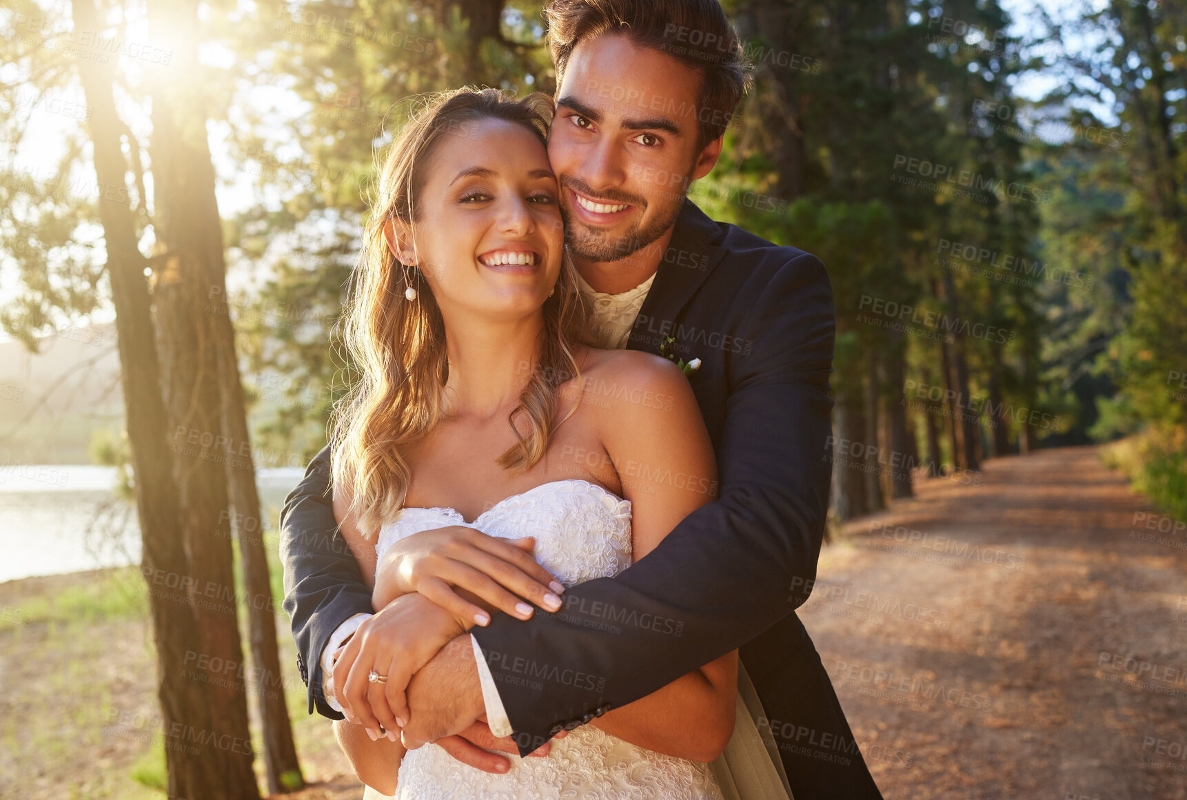 Buy stock photo Wedding portrait, couple and hug in park, nature and support of celebration, bridal union or marriage. Happy bride, groom and hugging in garden of love, life partner or celebrate commitment in spring