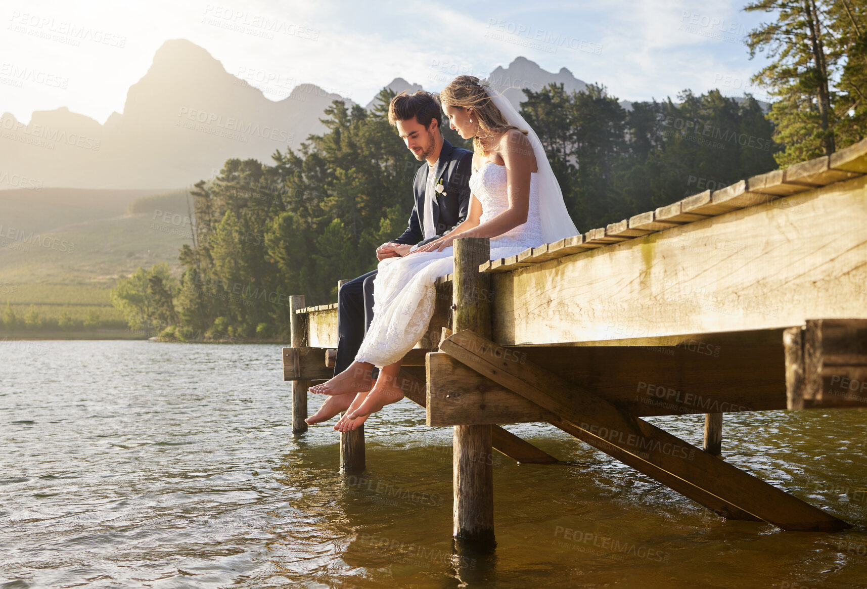 Buy stock photo Wedding, lake and couple in nature for marriage ceremony, commitment and trust outdoors. Love, relationship and man and woman bonding on honeymoon for partnership, romantic holiday and celebration