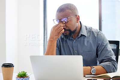 Buy stock photo Businessman, headache or laptop with stress for bankruptcy, pressure or deadline at office. Man, employee or accountant with migraine on computer for debt, strain or financial crisis at workplace