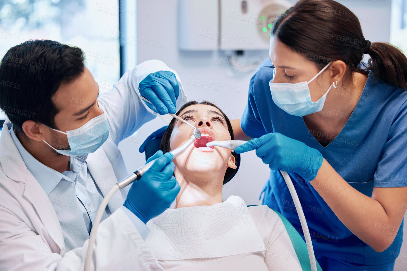 Buy stock photo Dentist team, patient and cleaning mouth for hygiene with healthcare and consultation, surgery and tooth extraction. People, teeth inspection and orthodontist with medical procedure for veneers