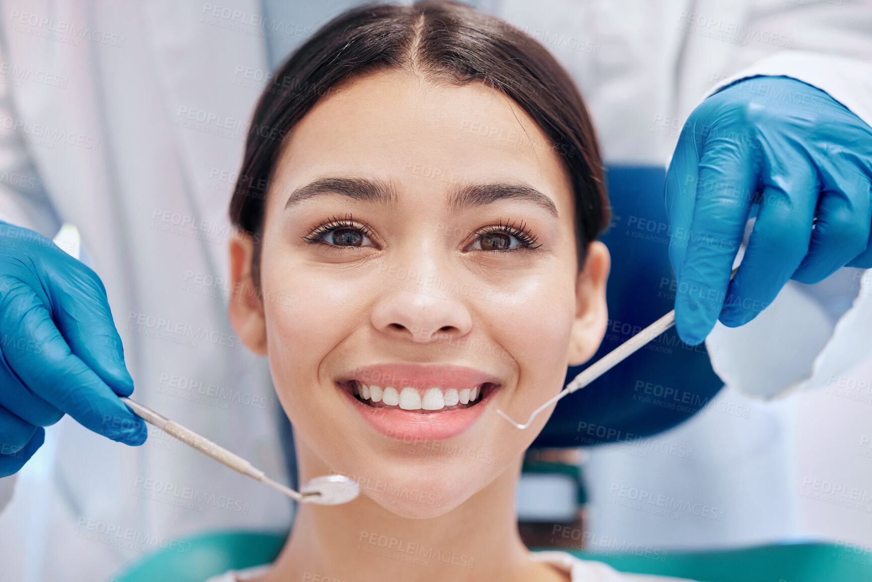 Buy stock photo Girl, smile and dentist with equipment in clinic with oral health, healthcare and dental care. Patient, happy and portrait in hospital for cleaning, veneers or teeth whitening with excavator by mouth