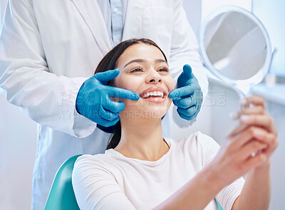 Buy stock photo Dental consultation, mirror and woman with smile after teeth whitening, service or mouth care. Healthcare, dentistry and happy female patient with orthodontist for oral hygiene, wellness and cleaning