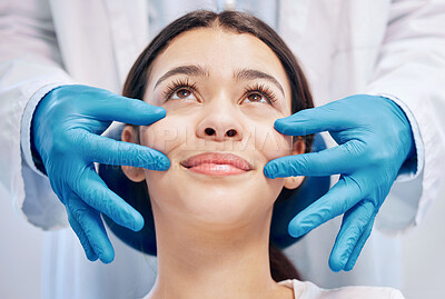 Buy stock photo Shot of a dentist pinching a patients cheeks