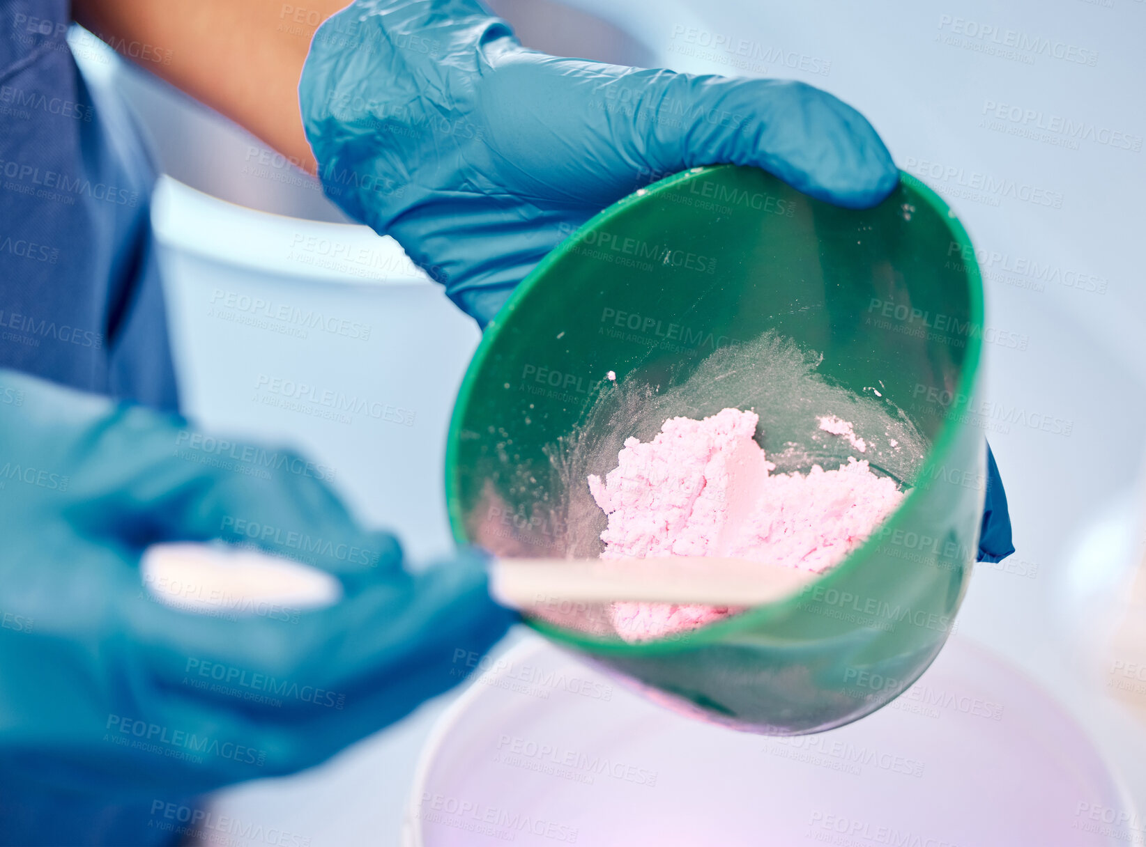 Buy stock photo Dentist, hand and powder for dentures impression with dental alginate mould, mixing technique or veneer plaster. Person, orthodontics and silicone material for implant treatment of teeth structure