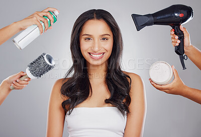 Buy stock photo Cropped portrait of an attractive young woman getting done backstage against a grey background