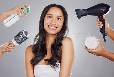 Buy stock photo Cropped shot of an attractive young woman getting done backstage against a grey background