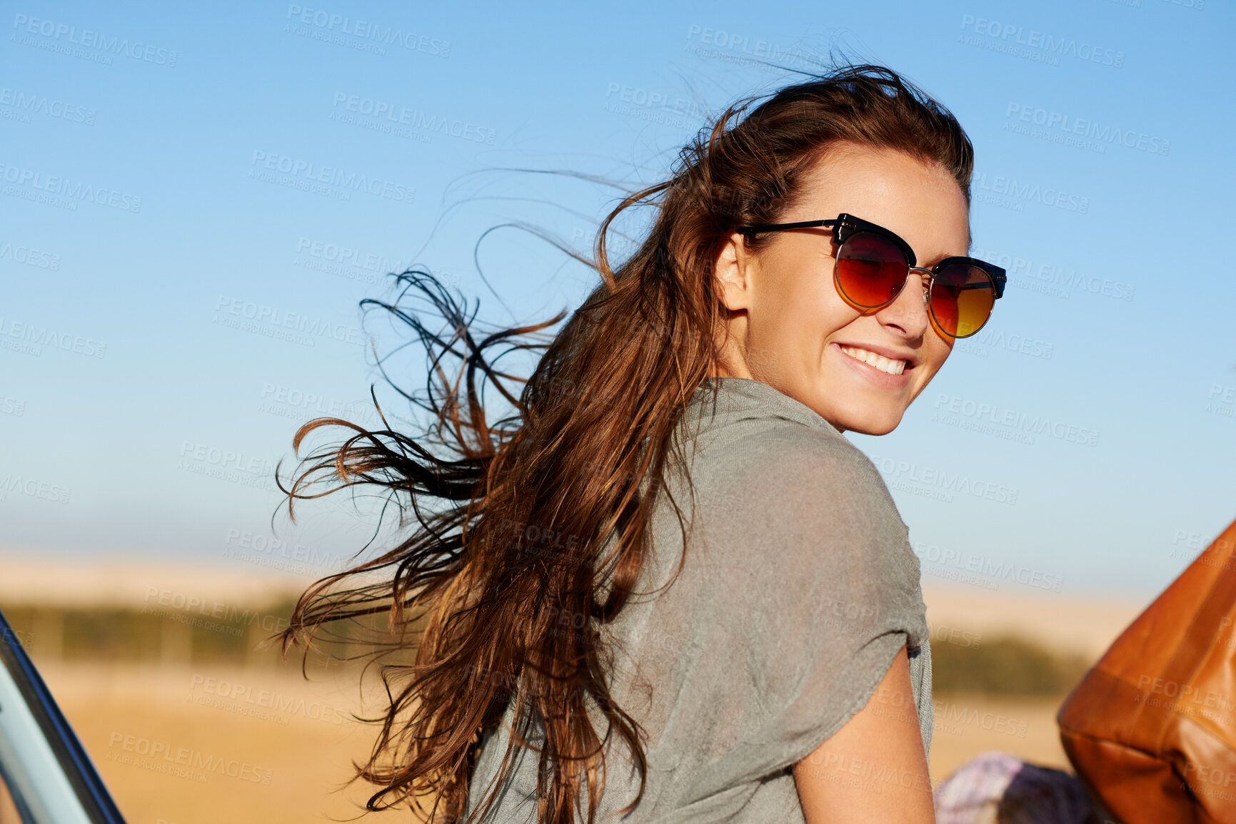 Buy stock photo Travel, road trip and young woman with sunglasses for a summer vacation or weekend adventure. Happy, smile and female person having fun with freedom while in nature for an outdoor holiday or journey.