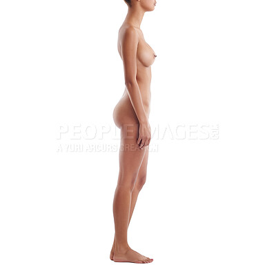 Buy stock photo Studio shot of a beautiful young woman posing nude against a white background