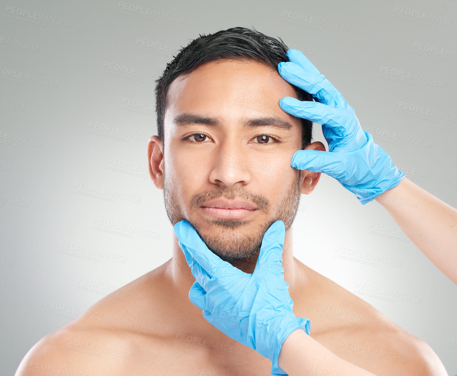 Buy stock photo Skincare, studio and portrait of man with consultation for facial cosmetics, change or service. Client, smile and surgeon with gloves on grey background for plastic surgery, inspection or dermatology