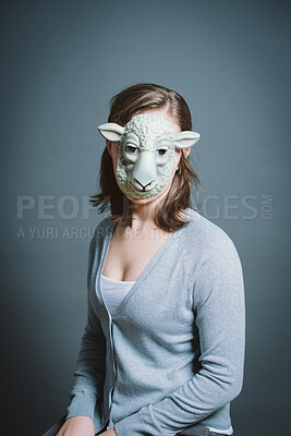 Buy stock photo Studio, portrait and person with sheep mask for character, facade and cosplay with pride for halloween. Woman model,  creativity and fantasy by gray background for persona, animal theme and costume