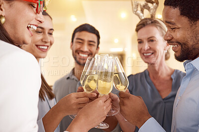 Buy stock photo Shot of a group of businesspeople toasting during a Christmas party at work