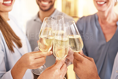 Buy stock photo Closeup shot of a group of unrecognisable businesspeople toasting with wine at work