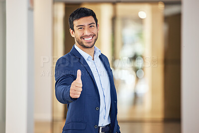 Buy stock photo Happy businessman, portrait and winning with thumbs up for success, vote or review at office. Young man or employee with smile, like emoji or yes sign for thank you, positive attitude or feedback