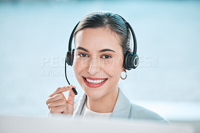 Buy stock photo Portrait of a young call centre agent working on a computer in an office