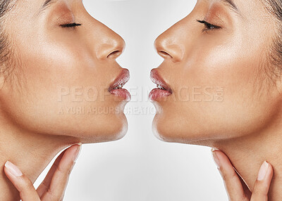 Buy stock photo Composite shot of an attractive young woman mirrored against a grey background