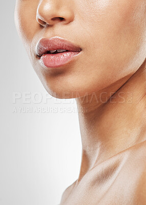 Buy stock photo Studio shot of an unrecognisable woman posing against a grey background