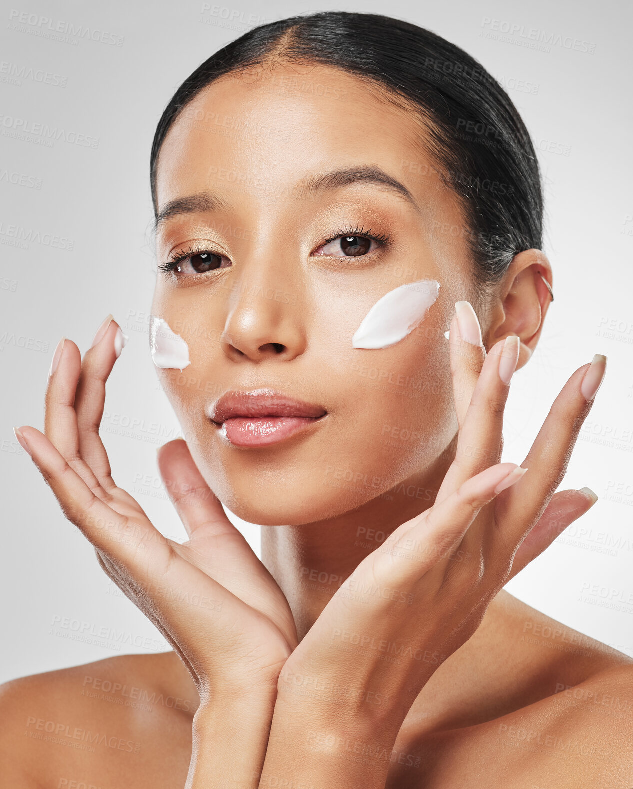 Buy stock photo Face, cream and woman in studio with product application, skincare and moisturizer. Wellness, portrait and person with healthy skin for dermatology, beauty and hydration on a white background